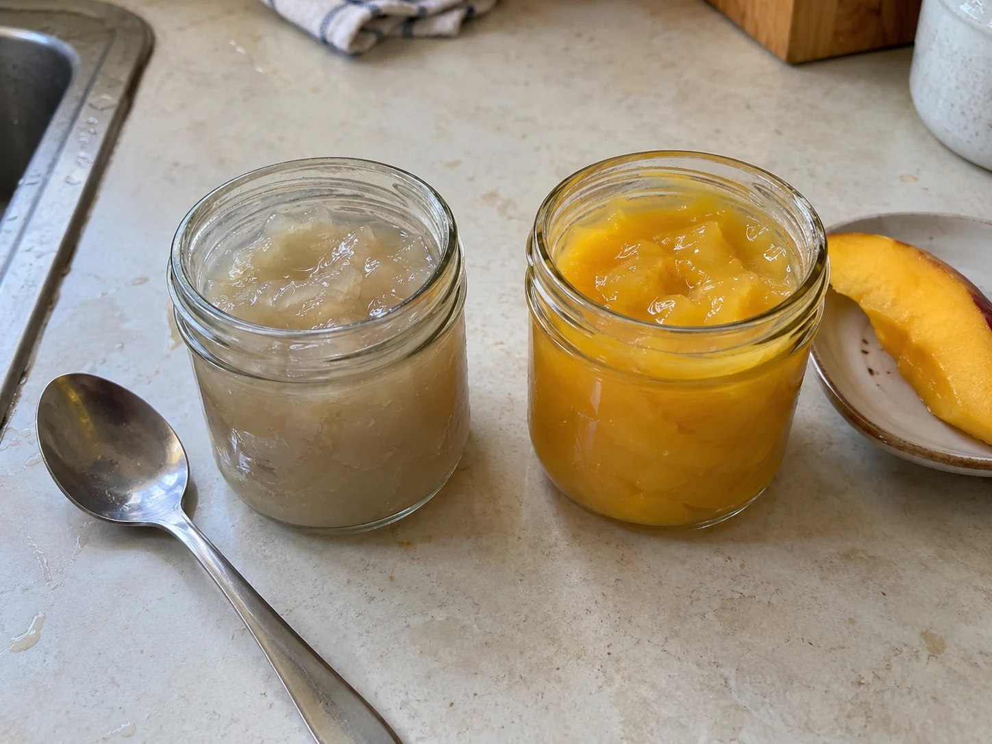 Two unbranded sea moss gel samples on a kitchen tabletop